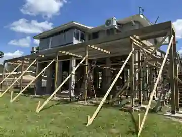 Elevated porch and deck framing at a real Larry's Framing job